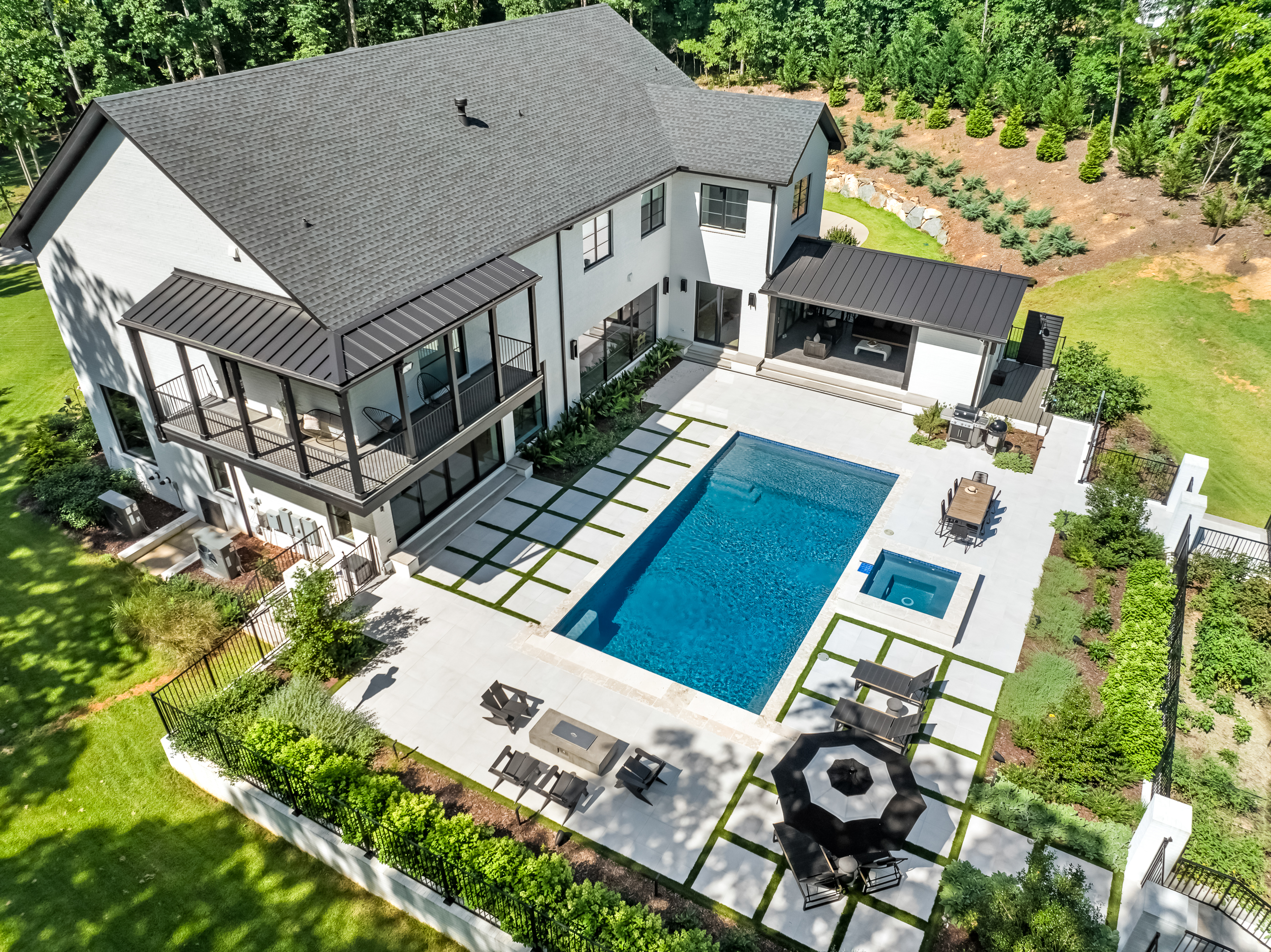 High angle view of a luxury home with landscaped garden in Charlotte
