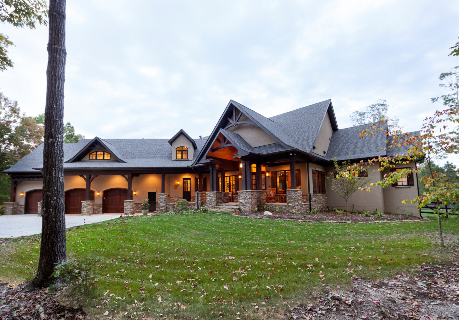 A large house with stone and wood accents.